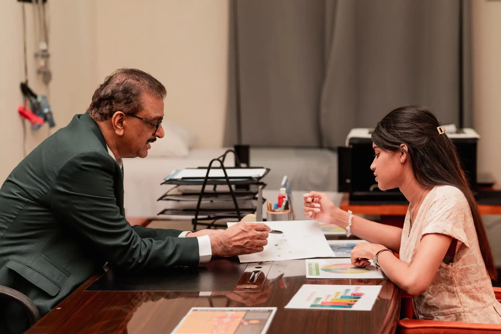 Doctor reviewing a personalised wellness plan with a guest