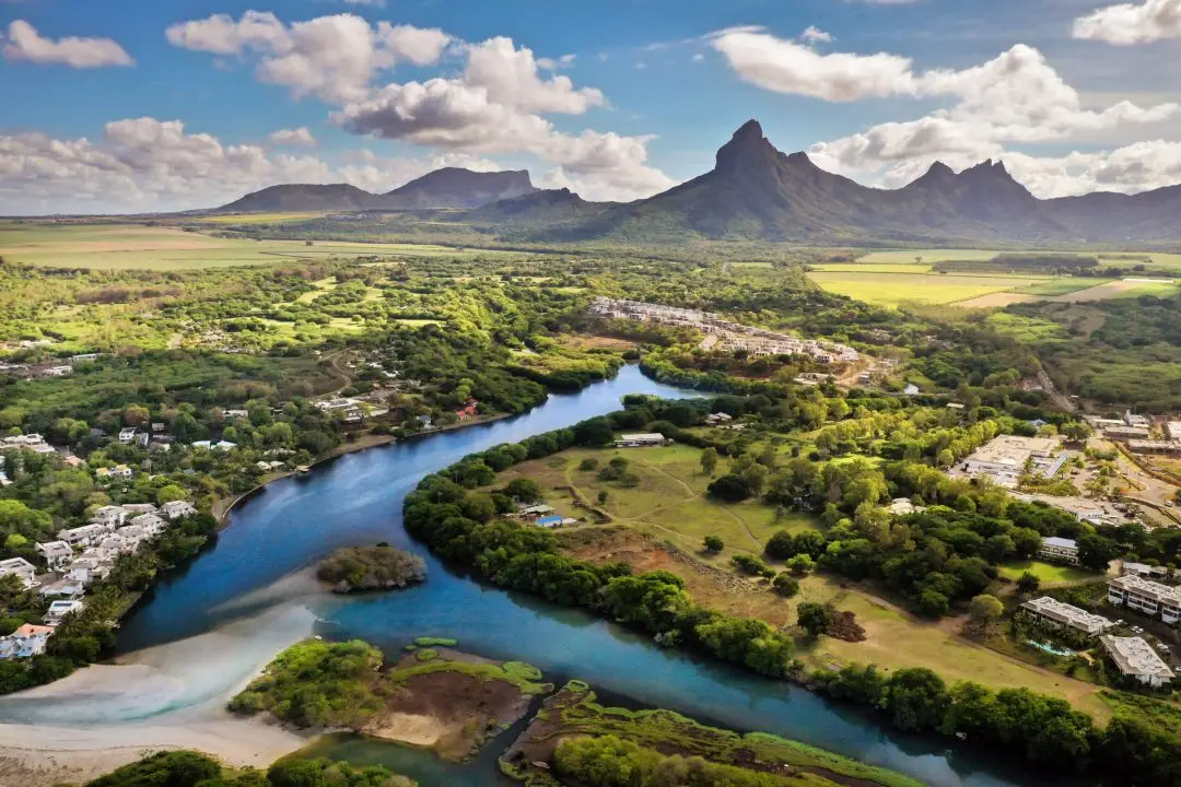 Turquoise lagoon and mountain landscape of Mauritius from above